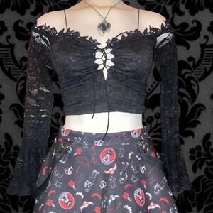 Dolls Kill vibes crop top with bell half sleeves